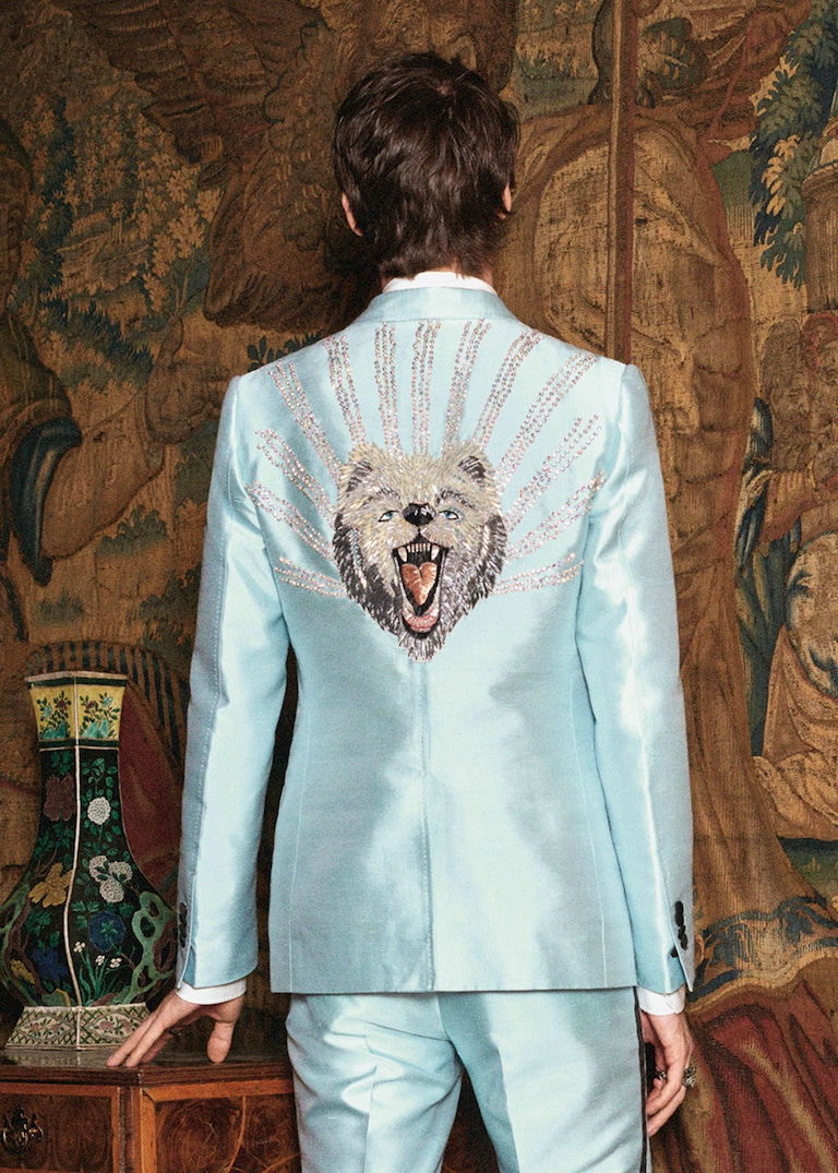 Tuxedos cut from bright silks and embroidered with roaring animals: unordinary men’s eveningwear by Alessandro Michele. The Evening Set