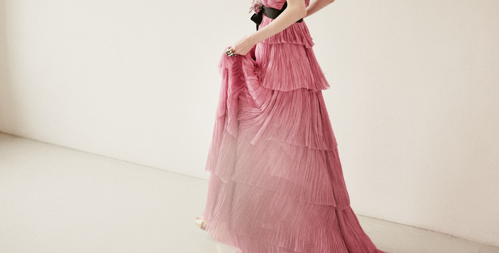 Sweeping <strong>dresses</strong> and the promise of the <strong>unexpected</strong>.Delicate movements