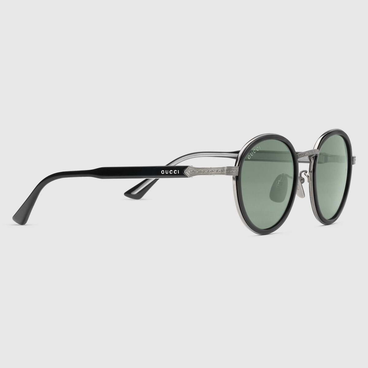 Round frame titanium sunglasses in ruthenium metal GUCCI AE