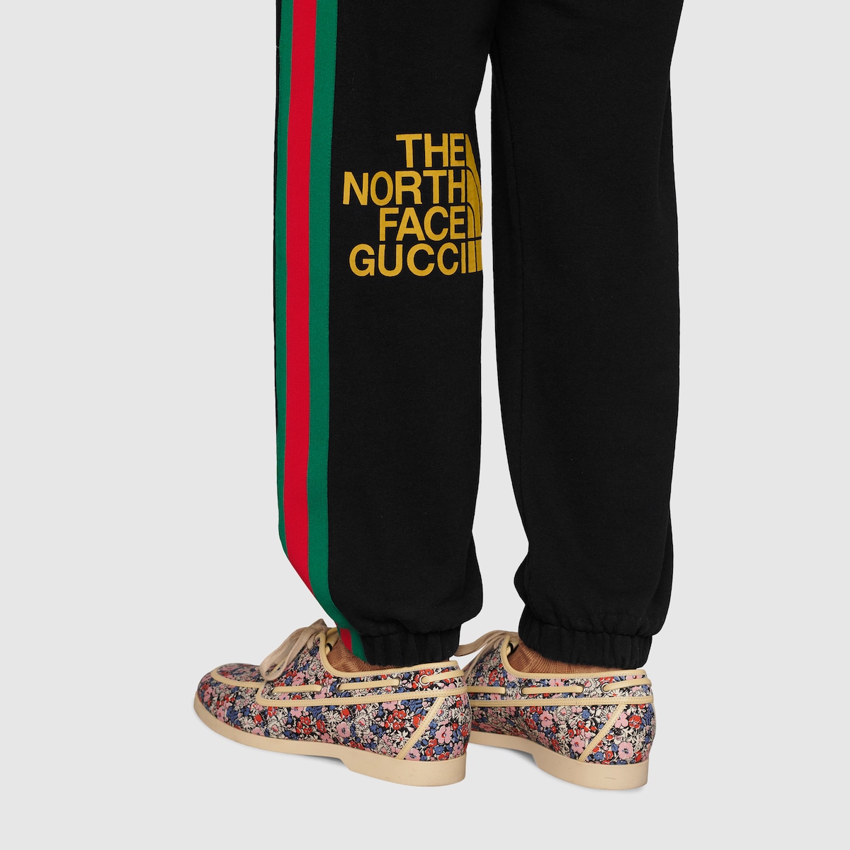 The North Face x Gucci  print cotton jogging bottoms in black