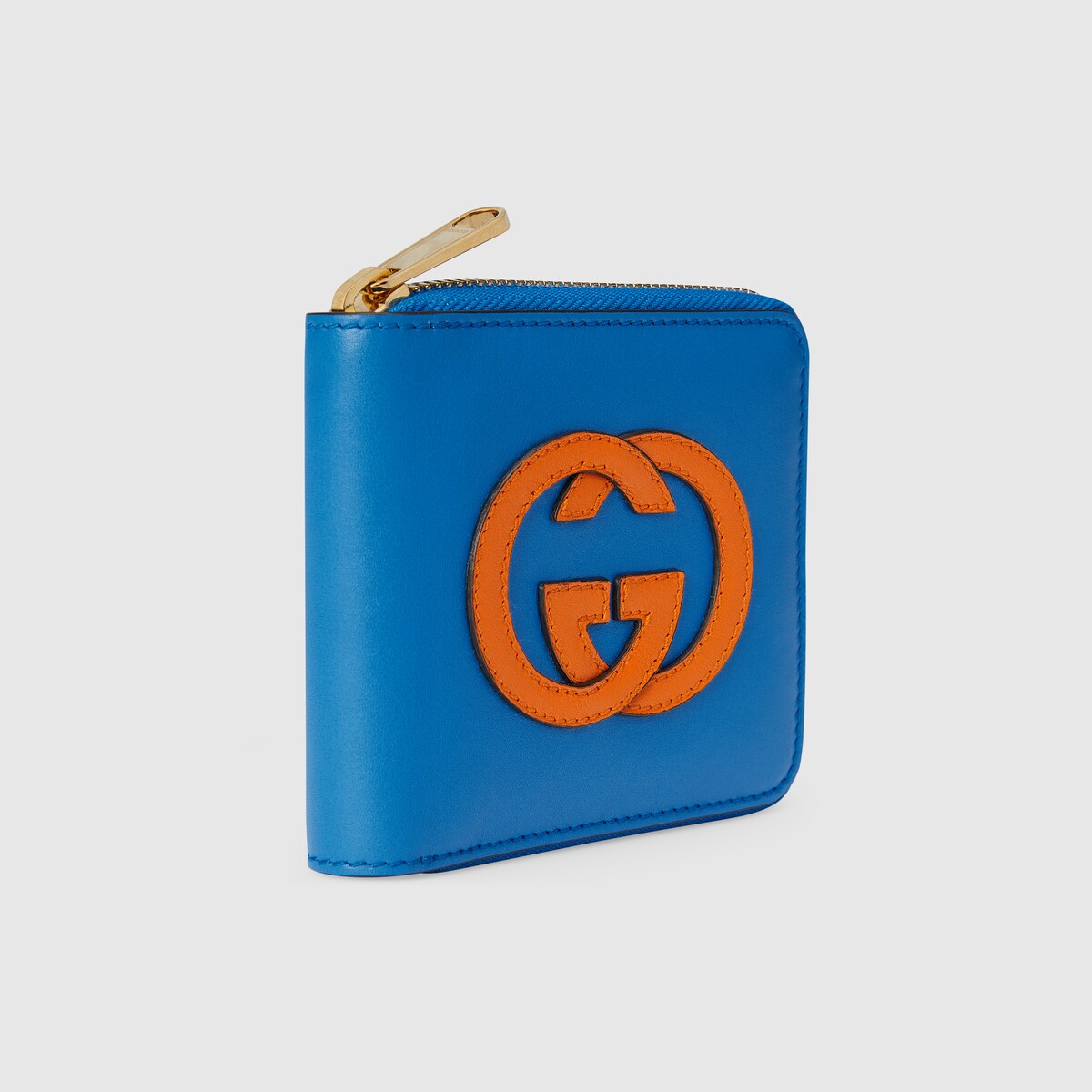 Interlocking G zip around wallet in blue and orange GUCCI® BE