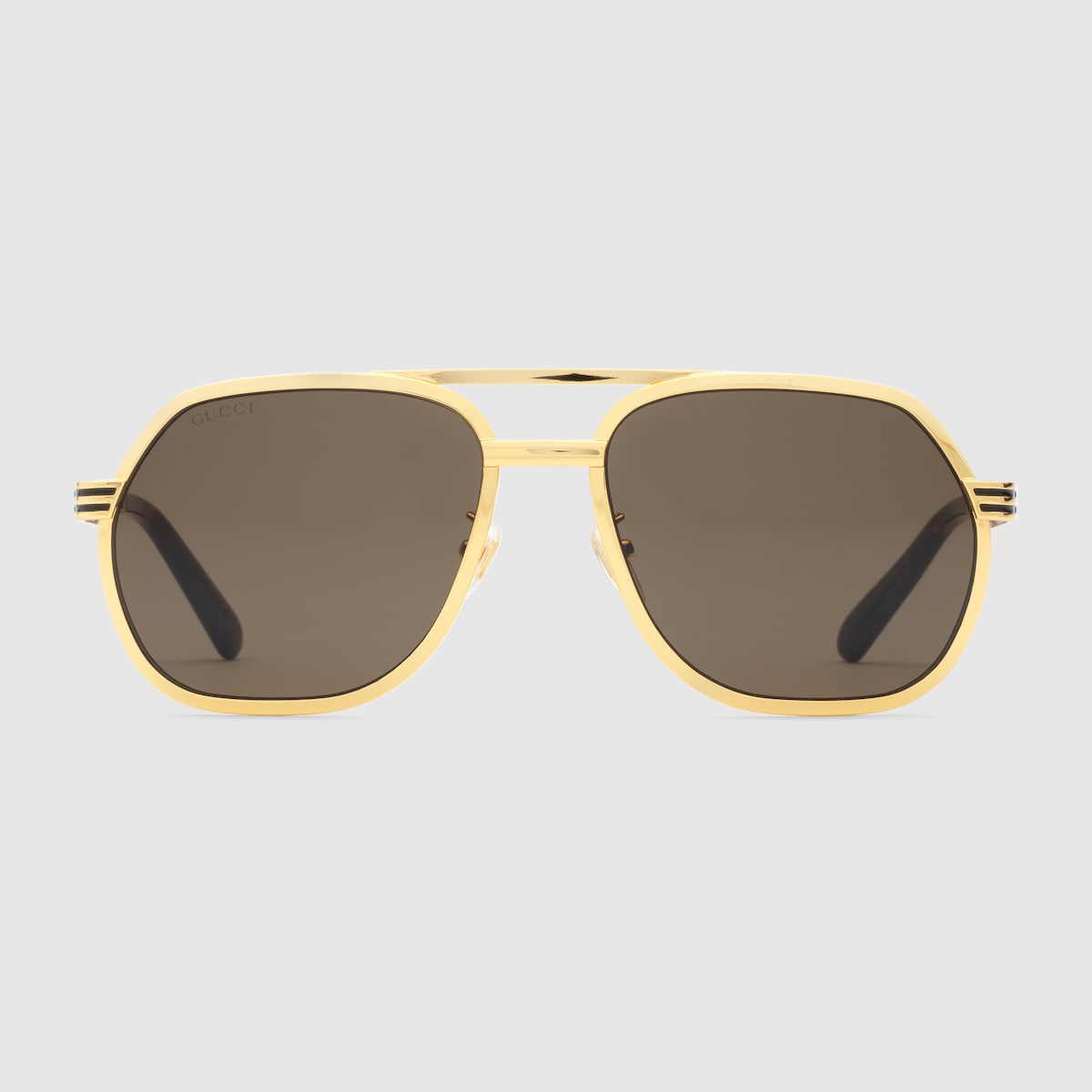 Lunettes de soleil a monture navigateur en metal dore jaune GUCCI FR