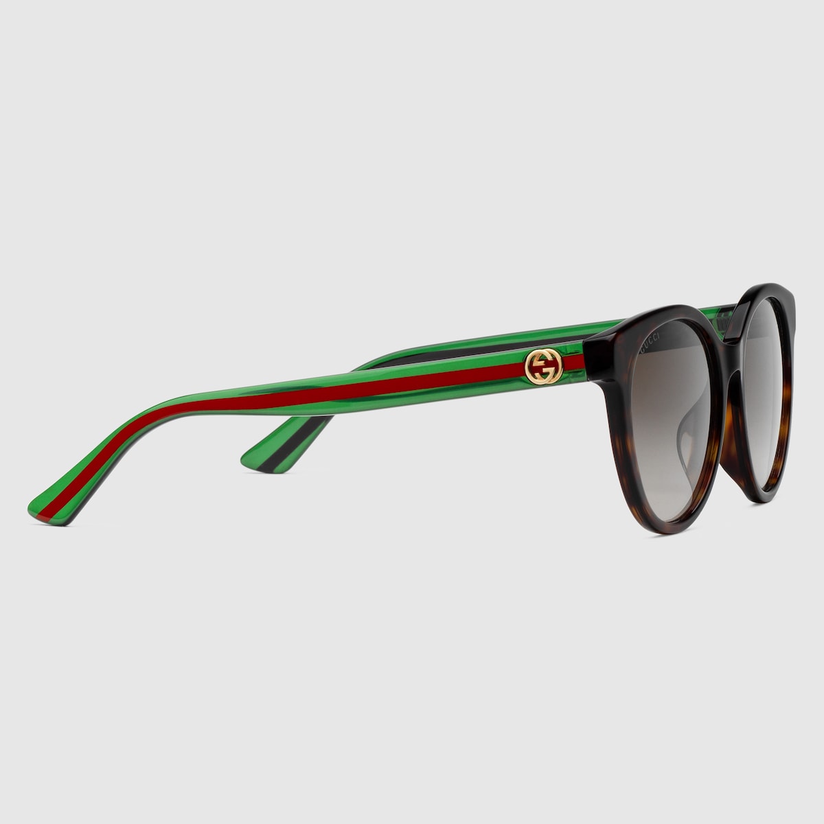 Gafas de sol con montura redonda en Estampado carey y acetato verde GUCCI ES