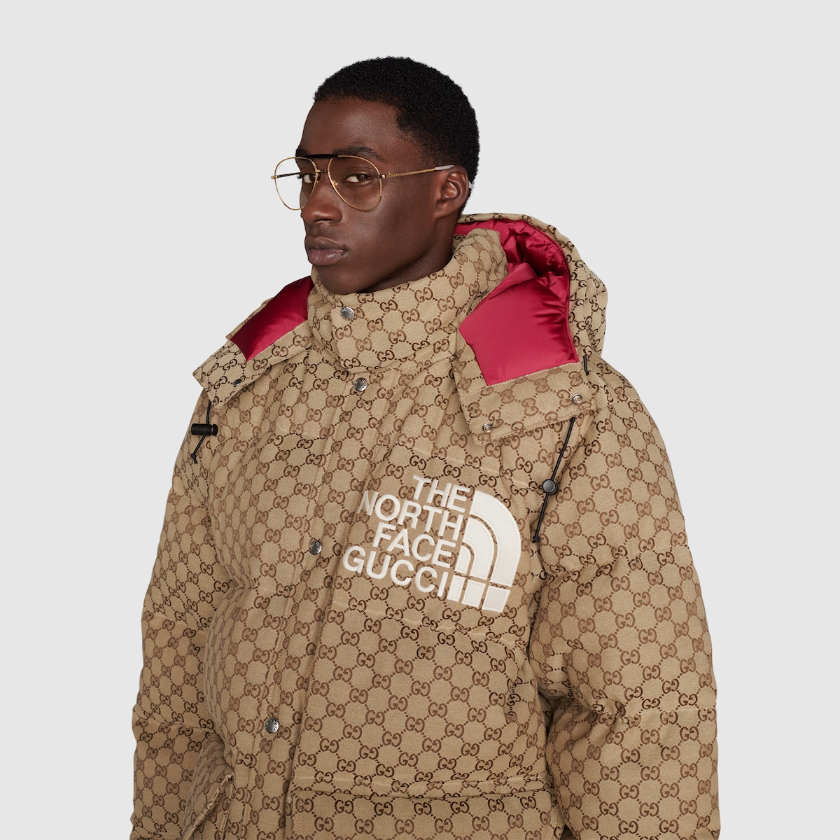 The North Face x Gucci padded jacket in beige and ebony | GUCCI® Australia