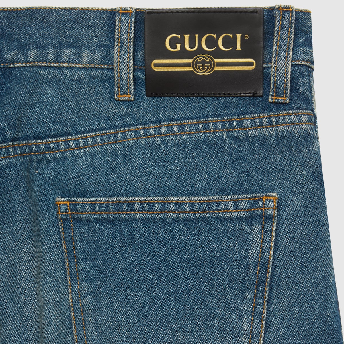 Tapered washed jeans in blue denim | GUCCI® Canada