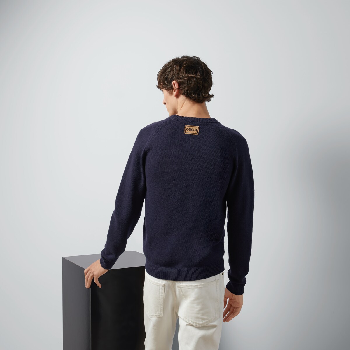 Wool jumper with Gucci patch in blue GUCCI® Australia