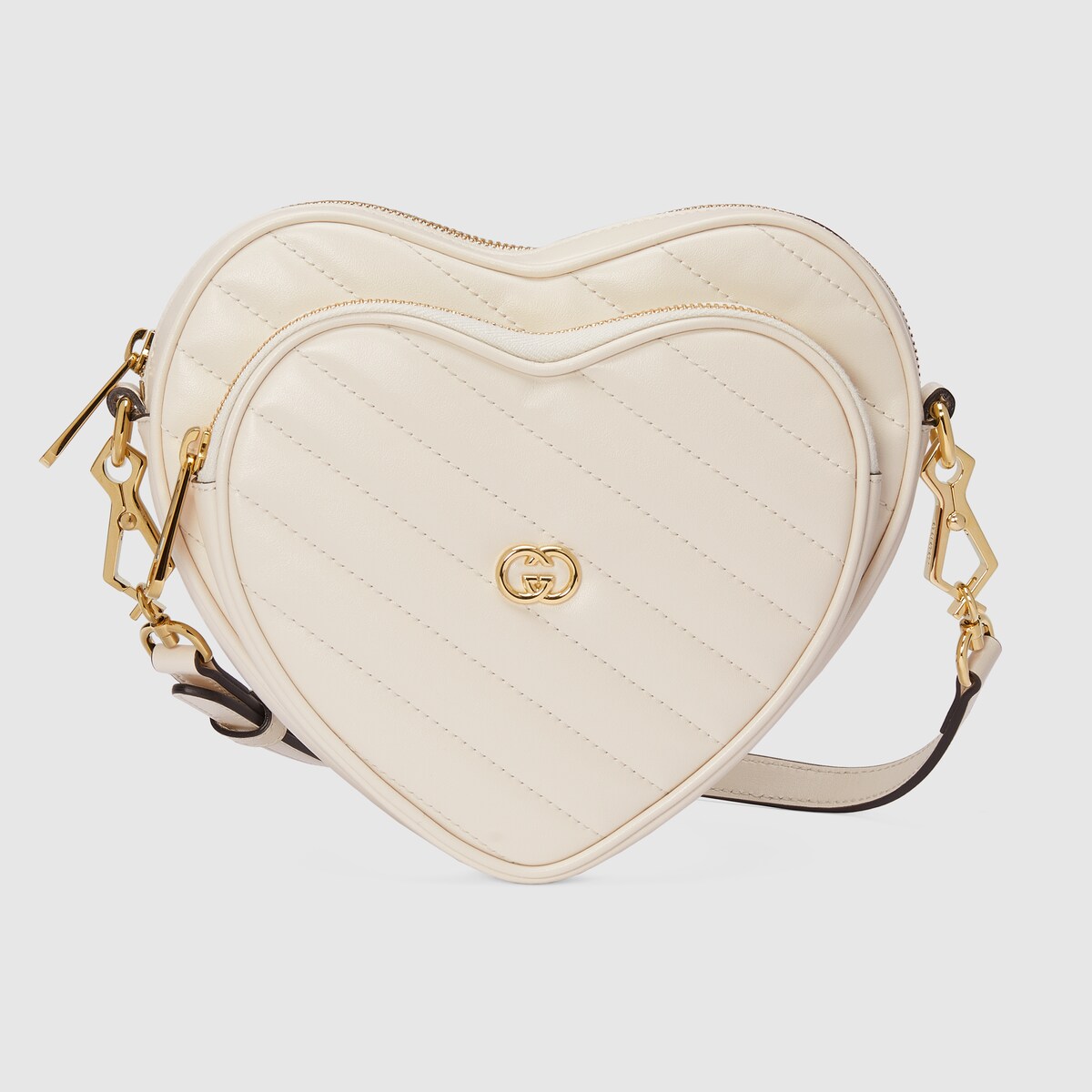 Mini-Schultertasche in Herzform mit GG in weißes Leder | GUCCI® DE