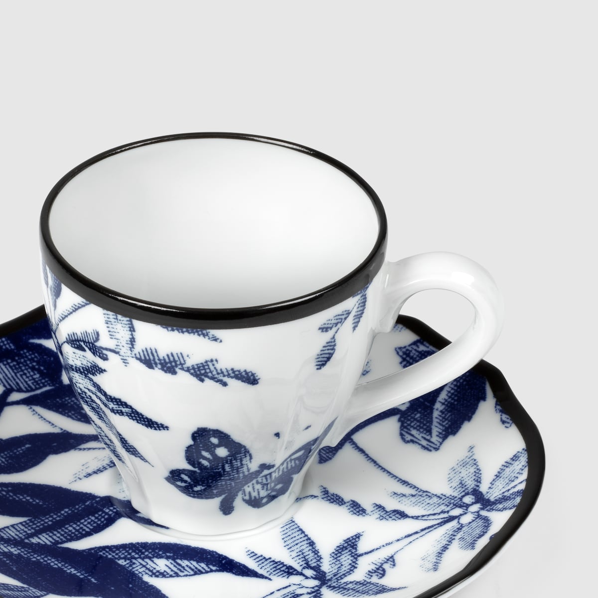 Herbarium coffee cup and saucer, set of two in blue and Herbarium coffee cup and saucer, set of two in blue and