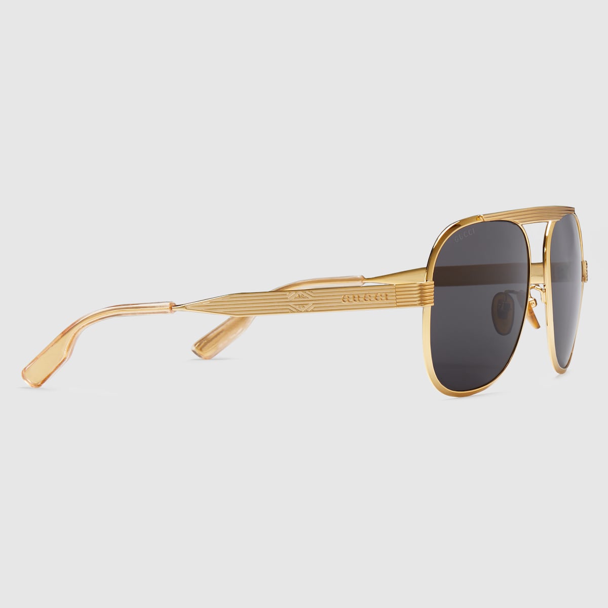 Navigator frame sunglasses in gold toned metal GUCCI NZ