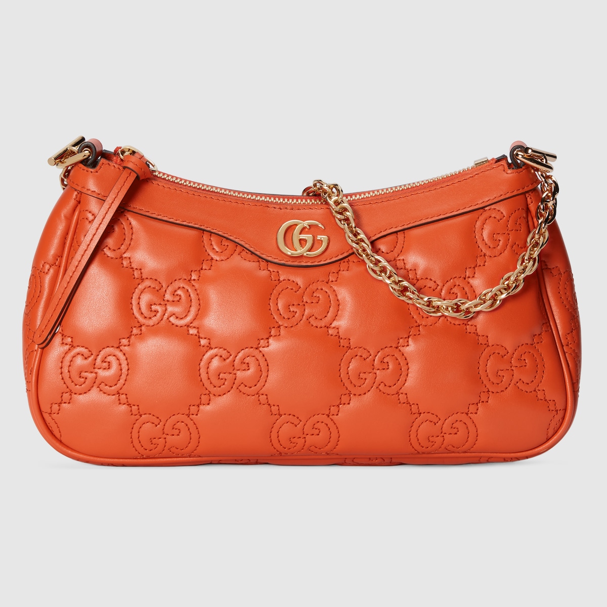 GUCCI バッグ GG Matelassé small shoulder bag in orange leather | GUCCI® SG