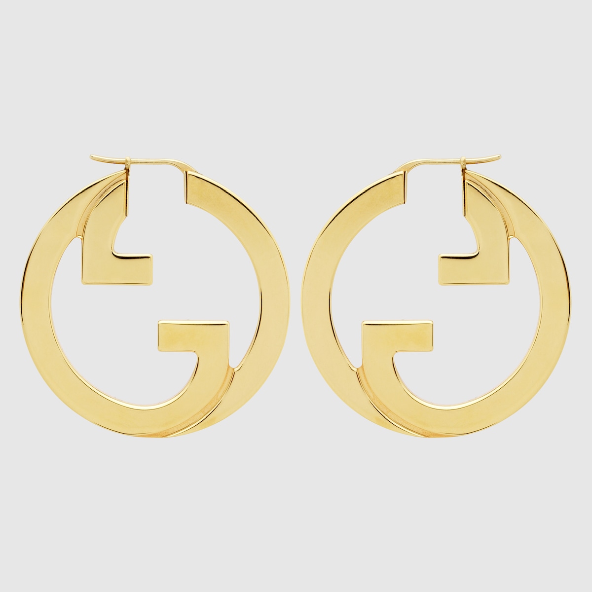 Gucci Blondie hoop earrings in gold-toned metal | GUCCI® US