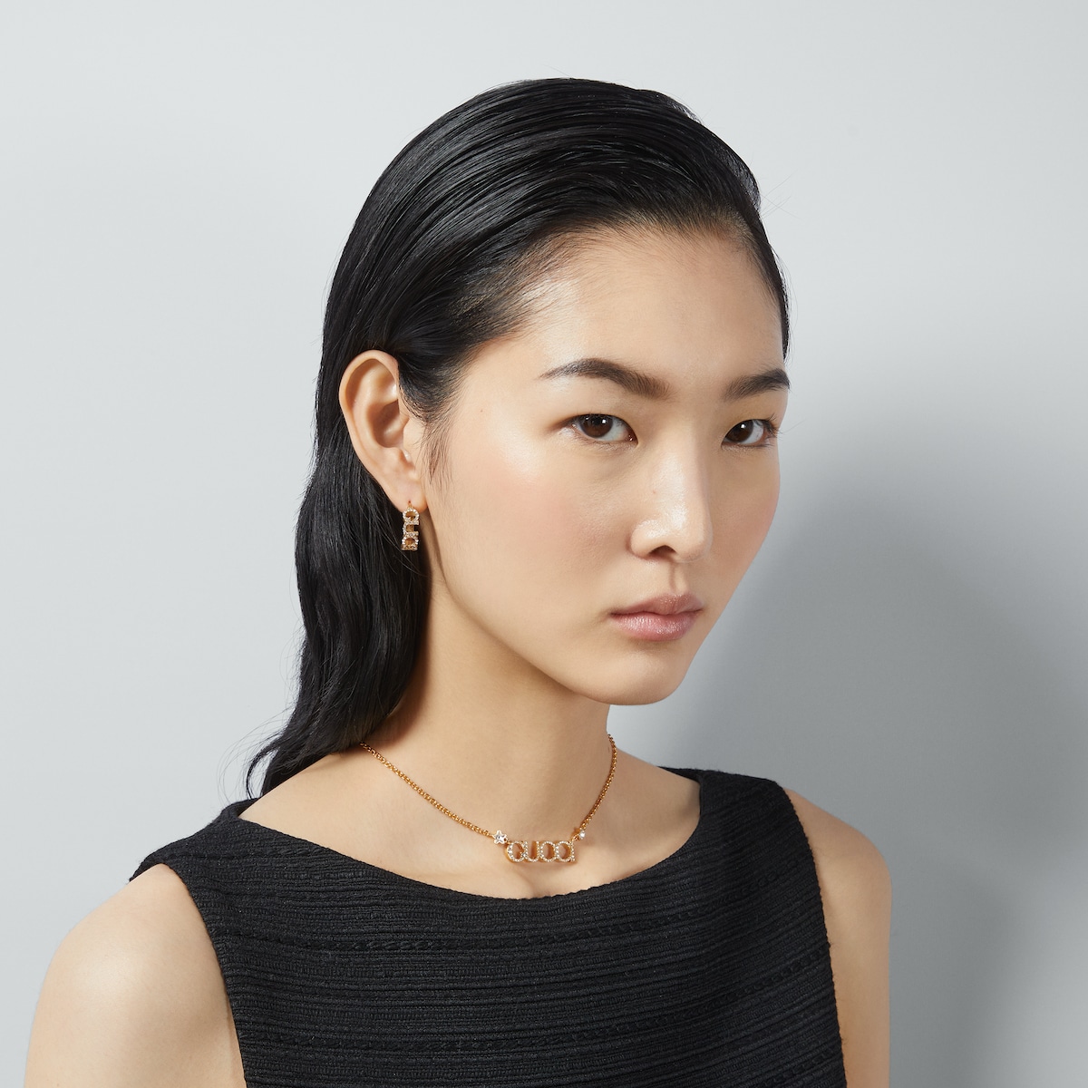 Gucci Script crystal hoop earrings in gold-toned | GUCCI® US Gucci Script crystal hoop earrings in gold-toned | GUCCI® US