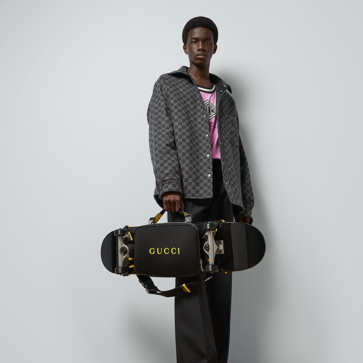 Gucci logo skateboard holder in black neoprene | GUCCI® US