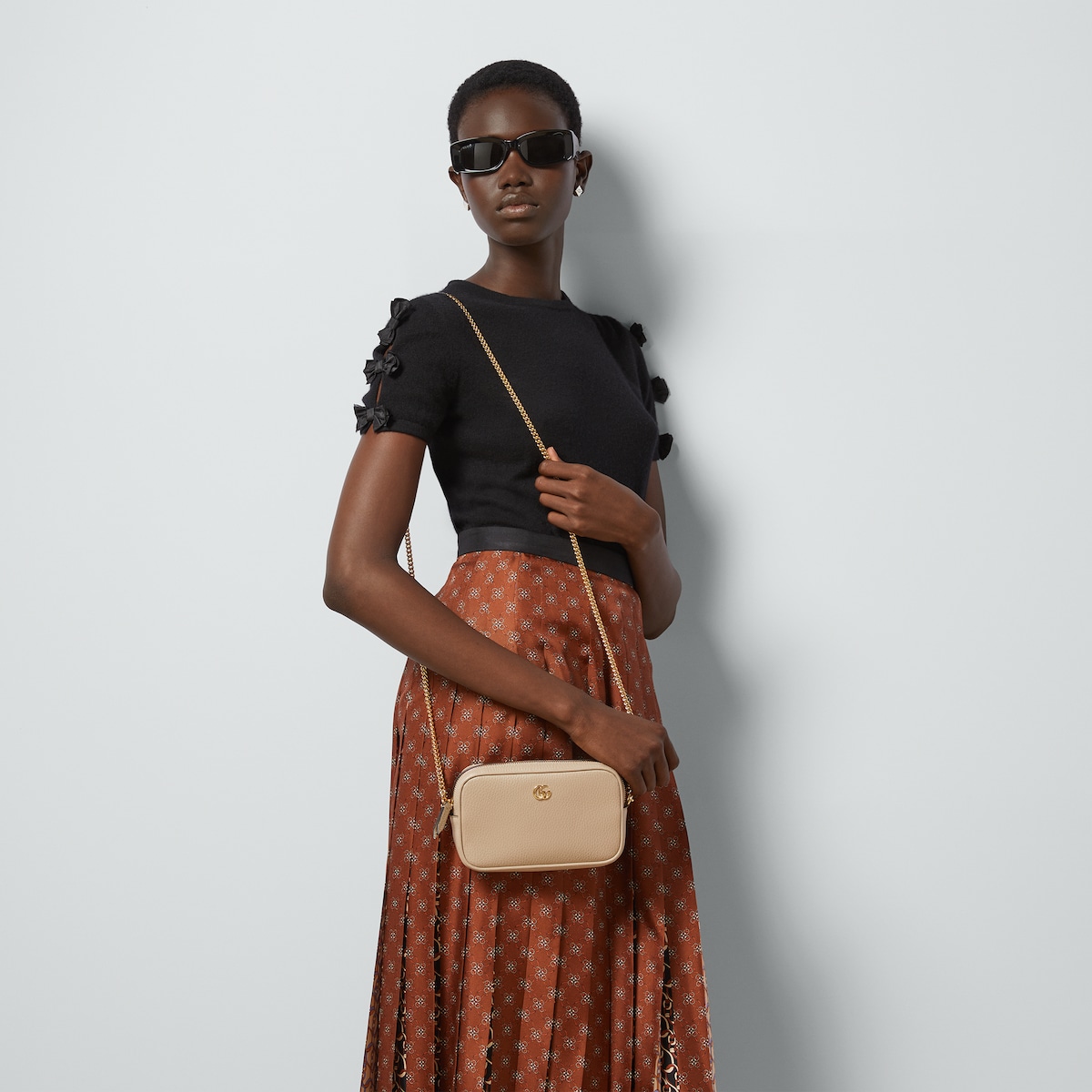 GG Marmont mini camera bag in beige leather | GUCCI® US