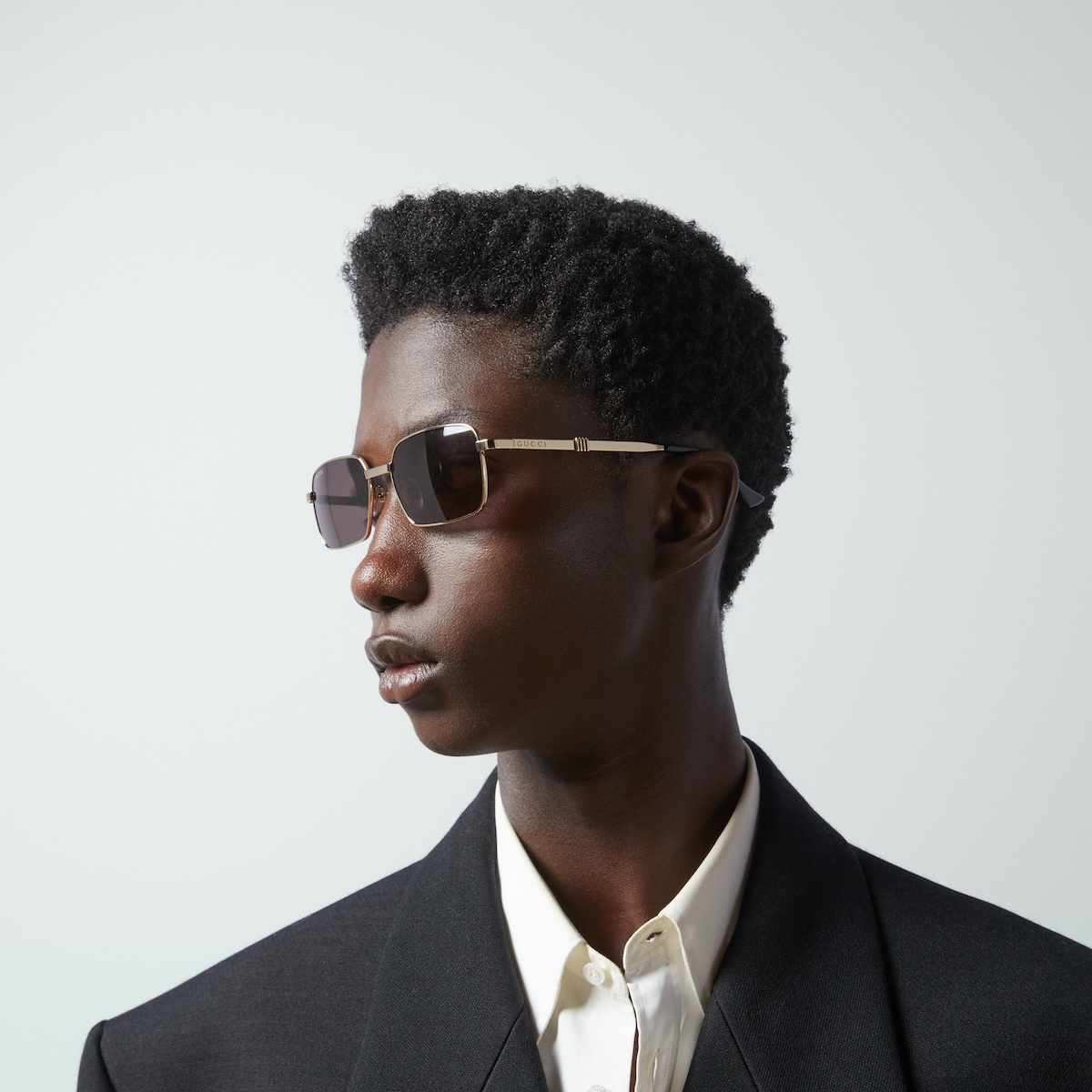 Rectangular-frame sunglasses in yellow gold-toned metal - thumbnail 3