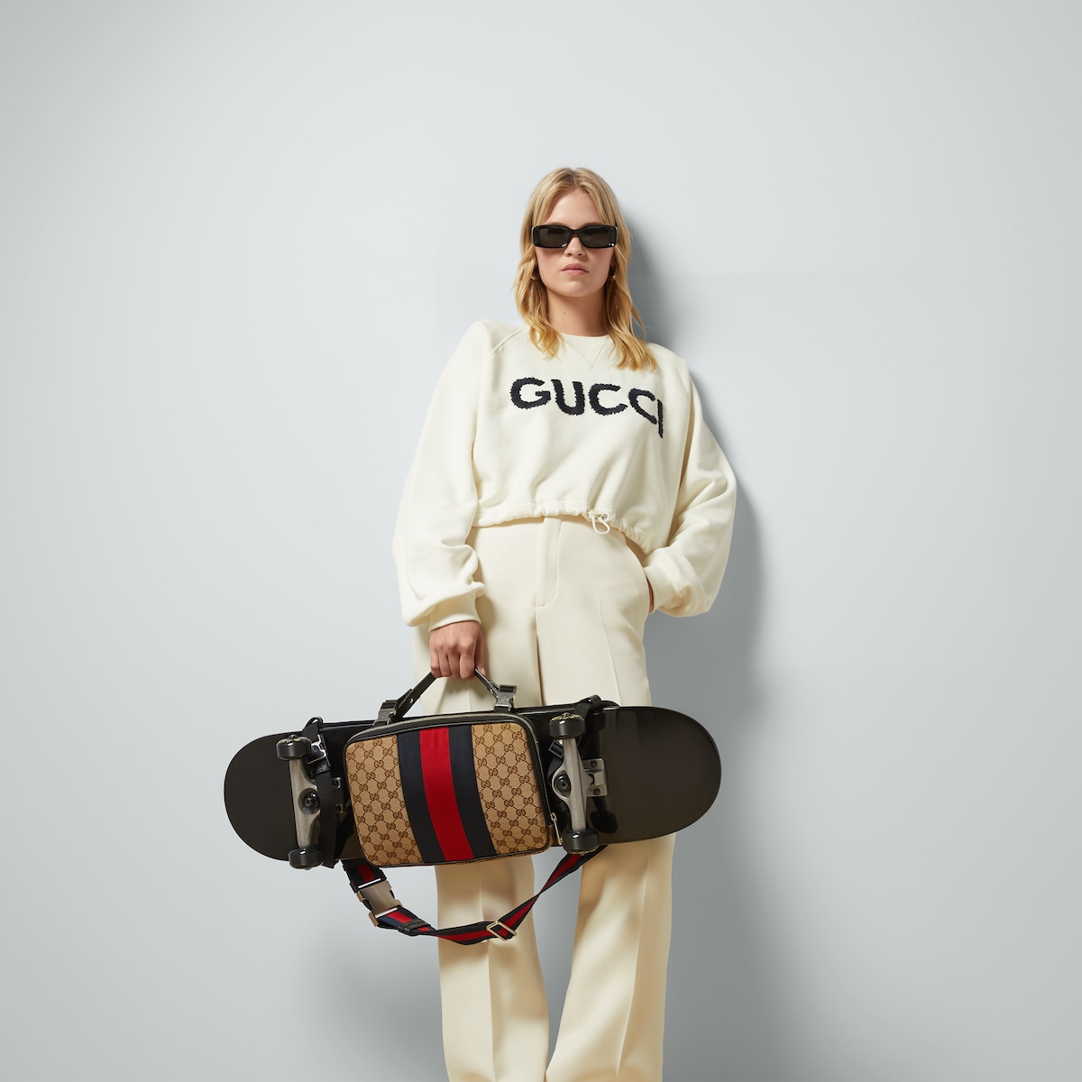 Gucci logo skateboard in black wood | GUCCI® US