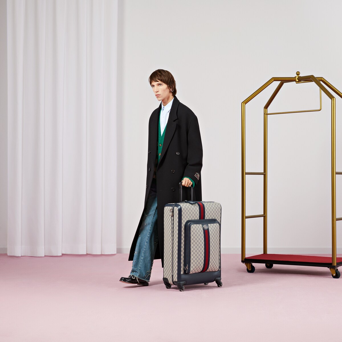 Gucci hot sale luggage mens