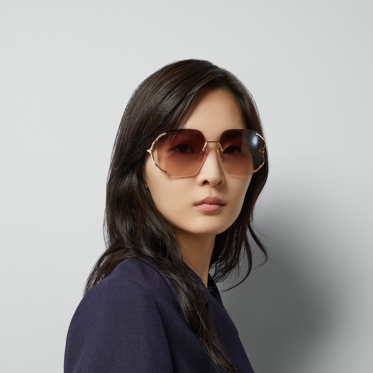 Square metal sunglasses in brown shaded lens