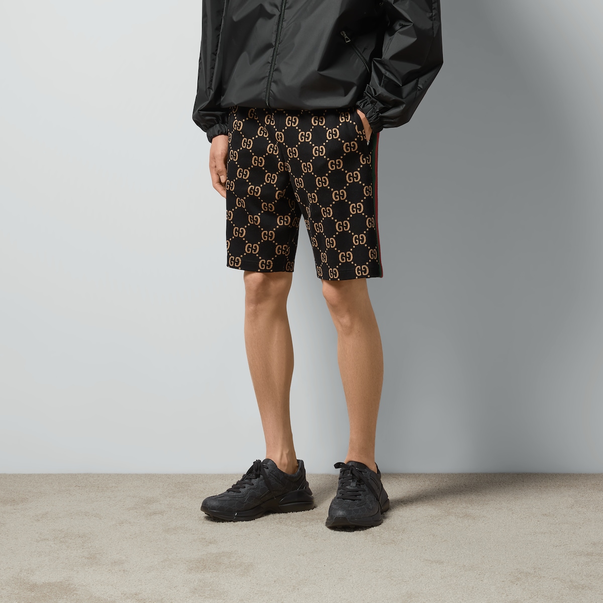 GG jersey cotton jogging shorts in black and camel GUCCI