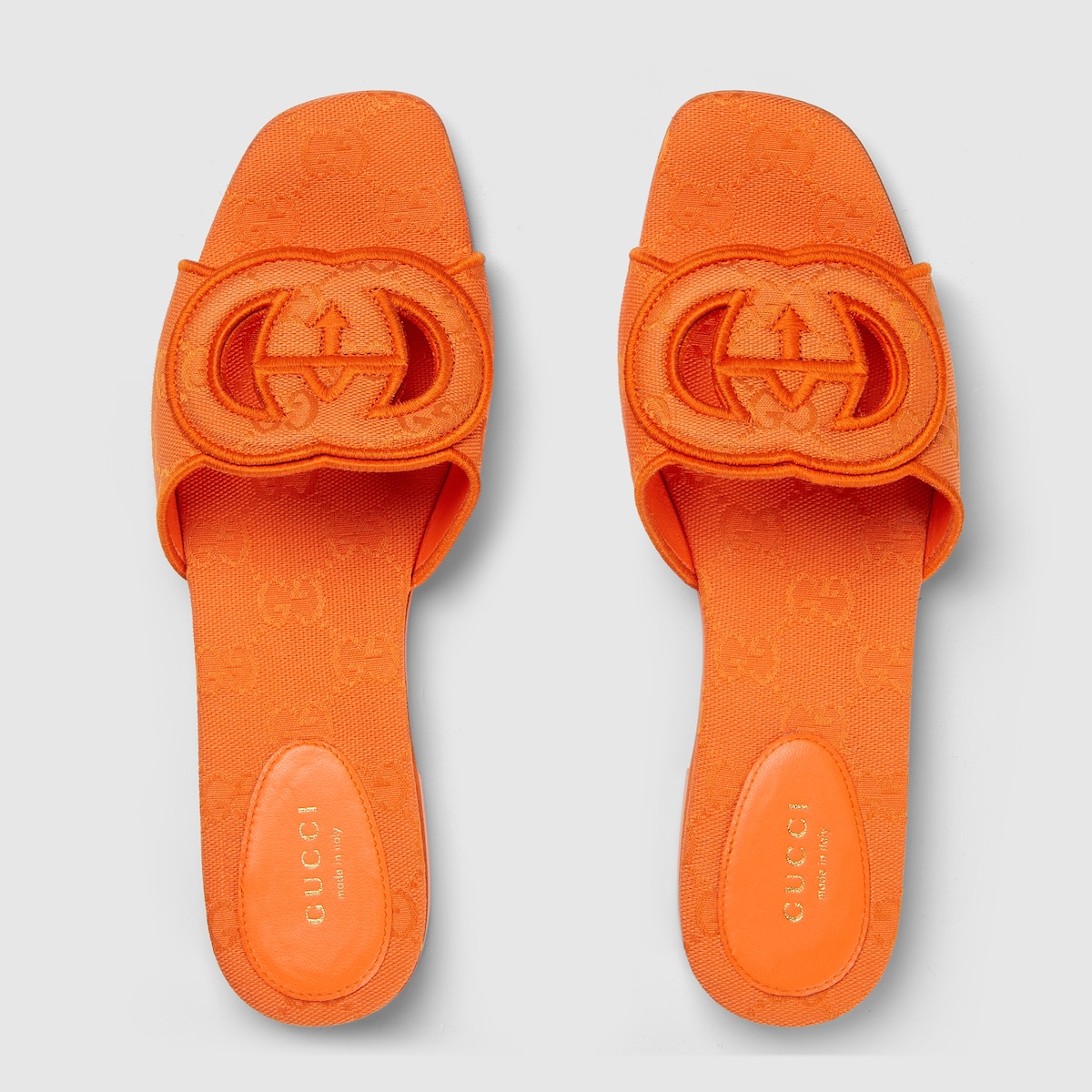 Women's Interlocking G slide sandal in orange GG canvas | GUCCI® US