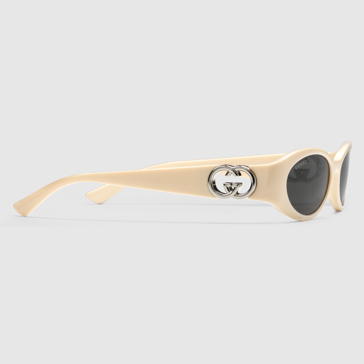 Gucci oval best sale frame sunglasses