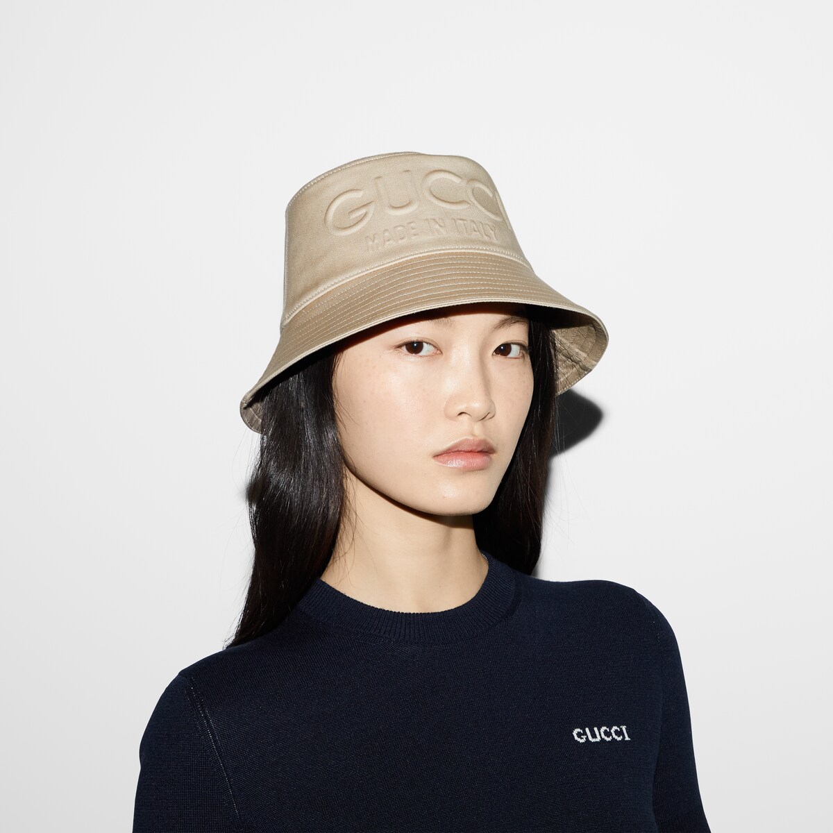 Gucci embossed bucket hat in beige fabric | GUCCI® US