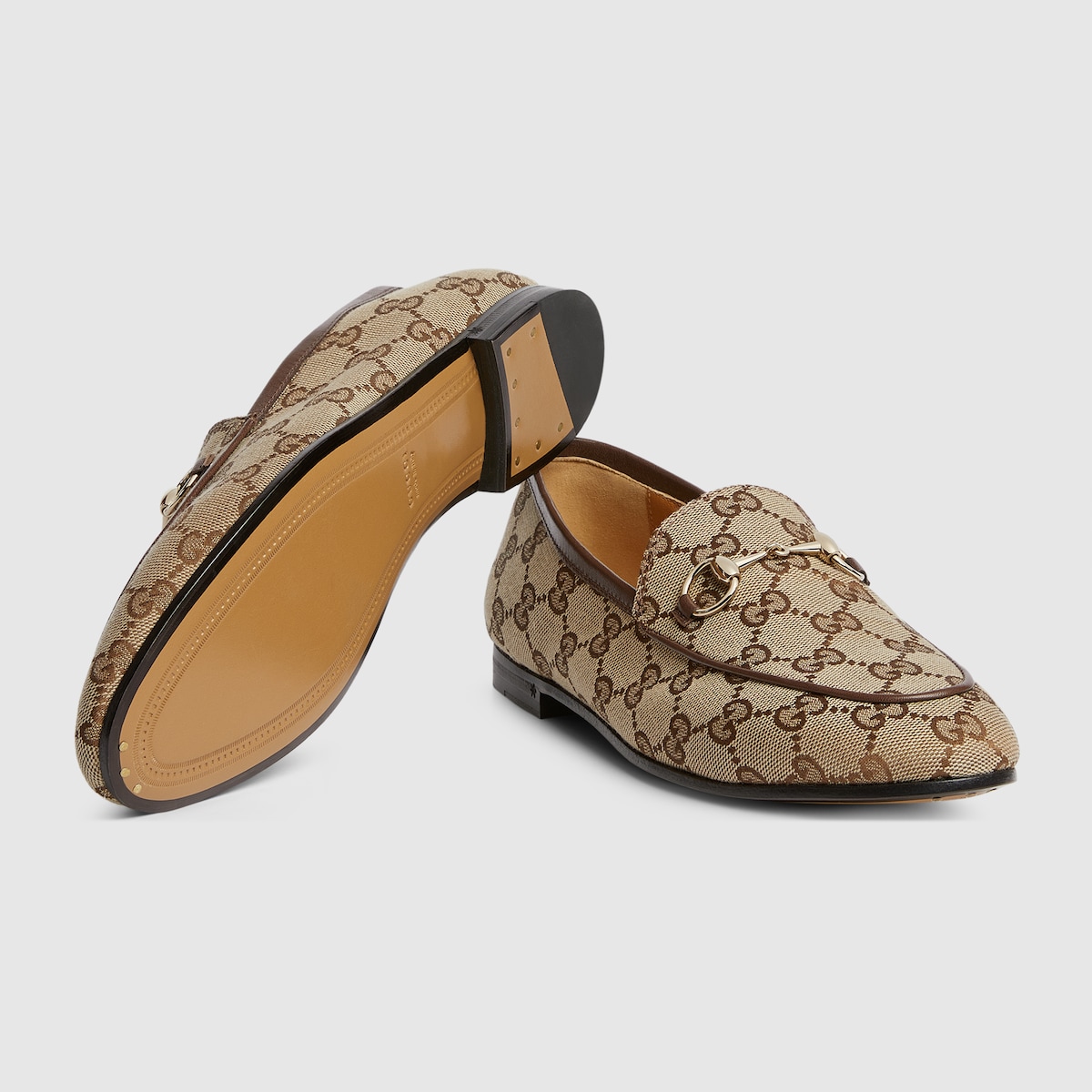 Women's Gucci Jordaan loafer in beige and ebony GG canvas