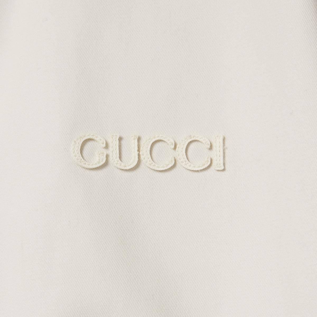 Reversible GG polyester jacket
