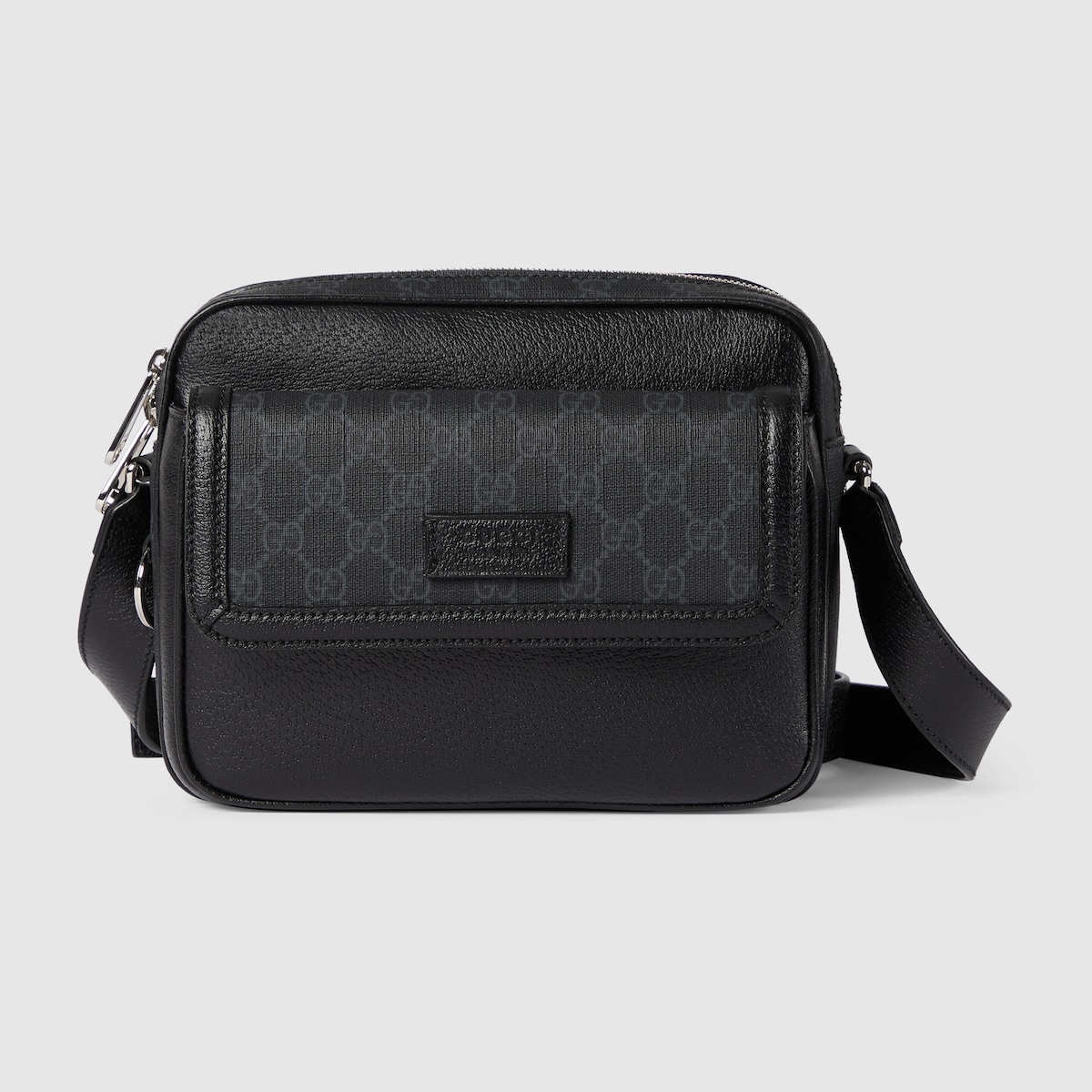 Small GG crossbody bag with tag in black leather | GUCCI® US