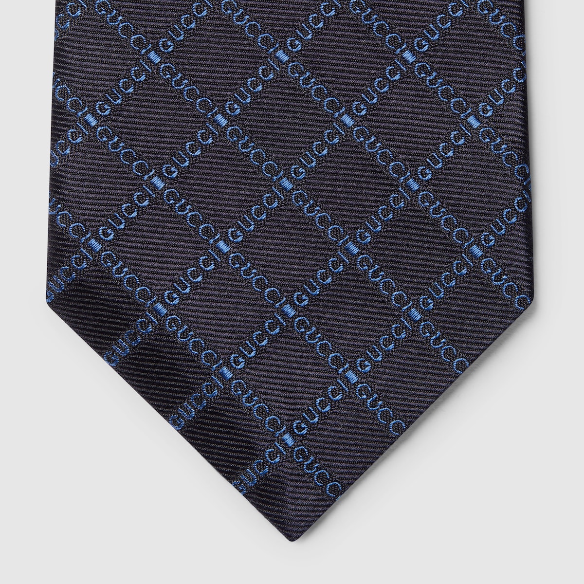 グッGUCCI ナロータイ ネイビー インターロッキング シェリーライン Gucci logo silk jacquard tie in navy and blue | GUCCI® US