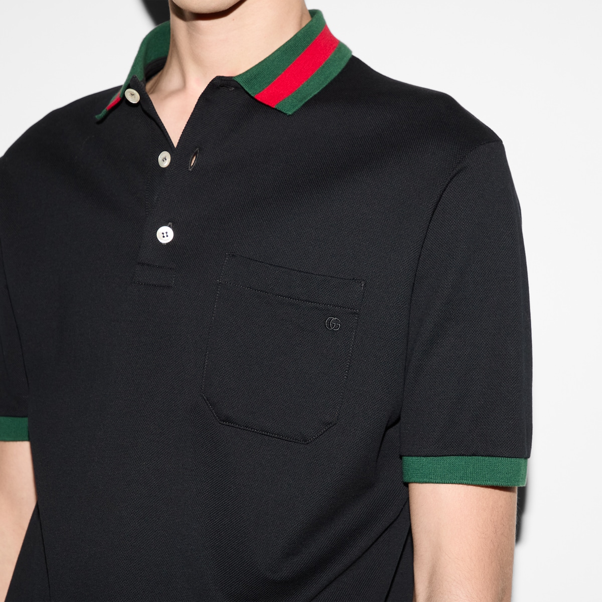 Polo in piquet di cotone con colletto Web in nero | GUCCI® IT