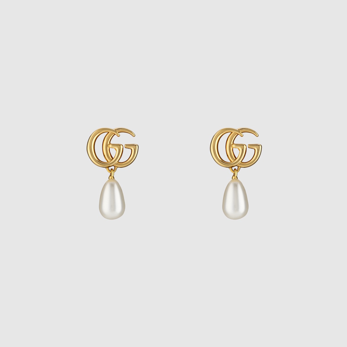 GG Marmont pearl drop earrings in yellow gold-toned metal | GUCCI® CA