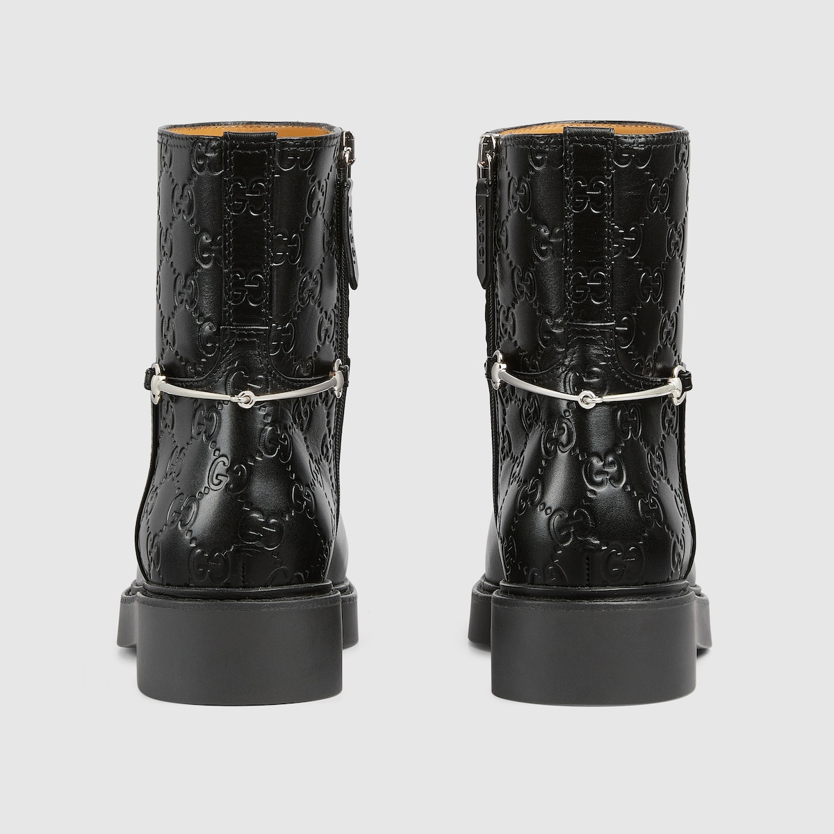 Women s slim Horsebit ankle boot in black GG leather GUCCI AE