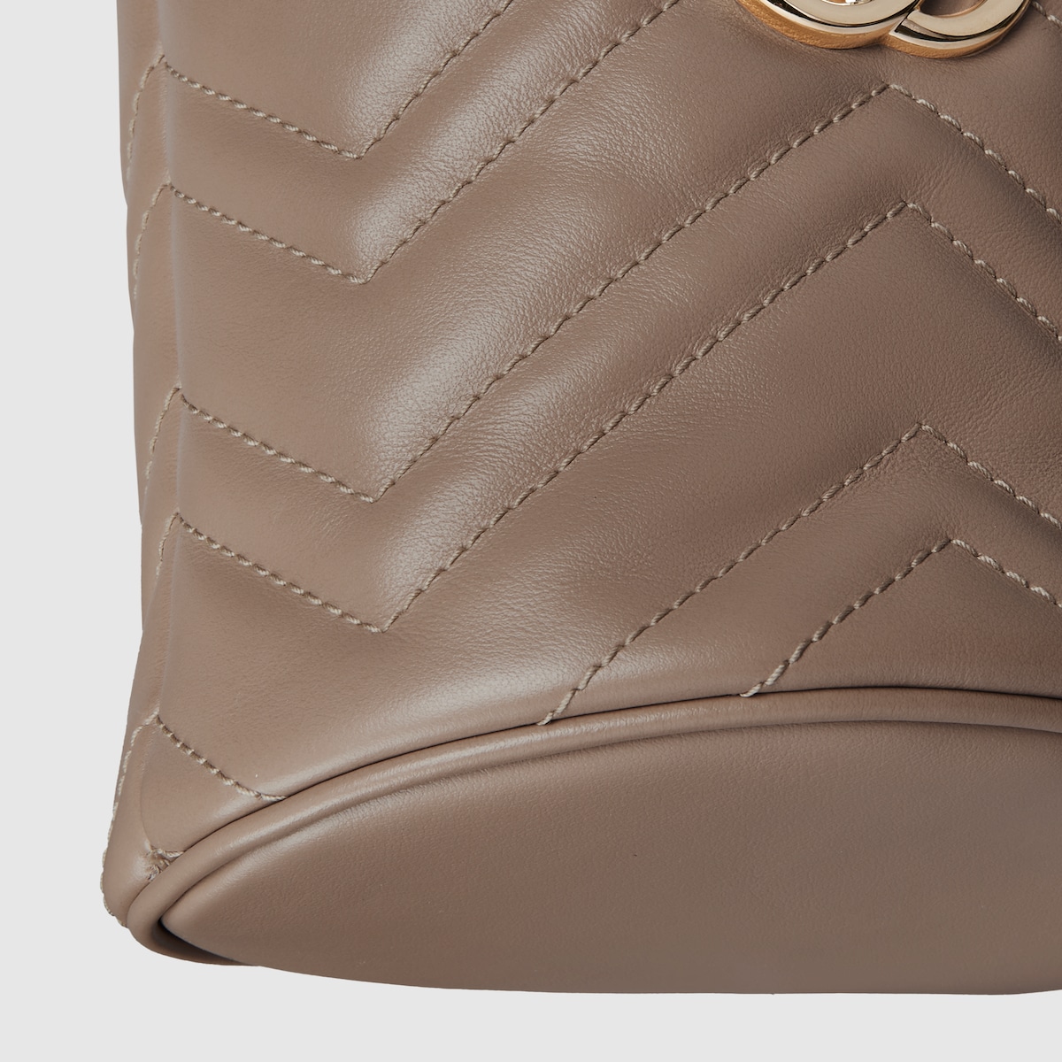 GG Marmont small bucket bag in taupe leather | GUCCI® US