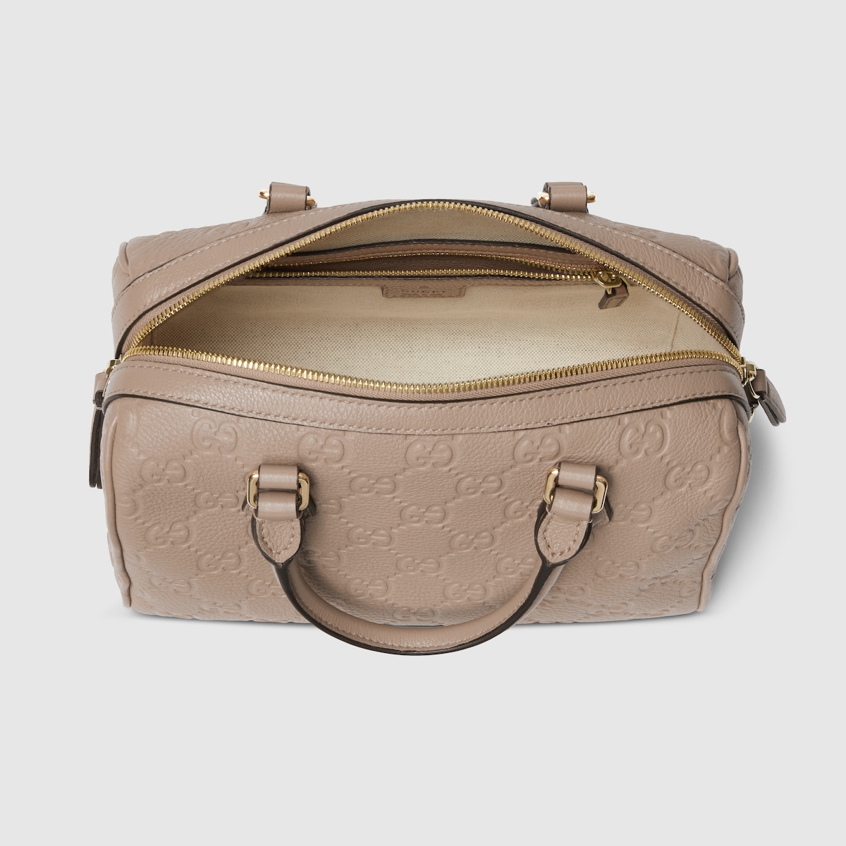 GG Emblem medium boston bag in taupe GG leather | GUCCI® US
