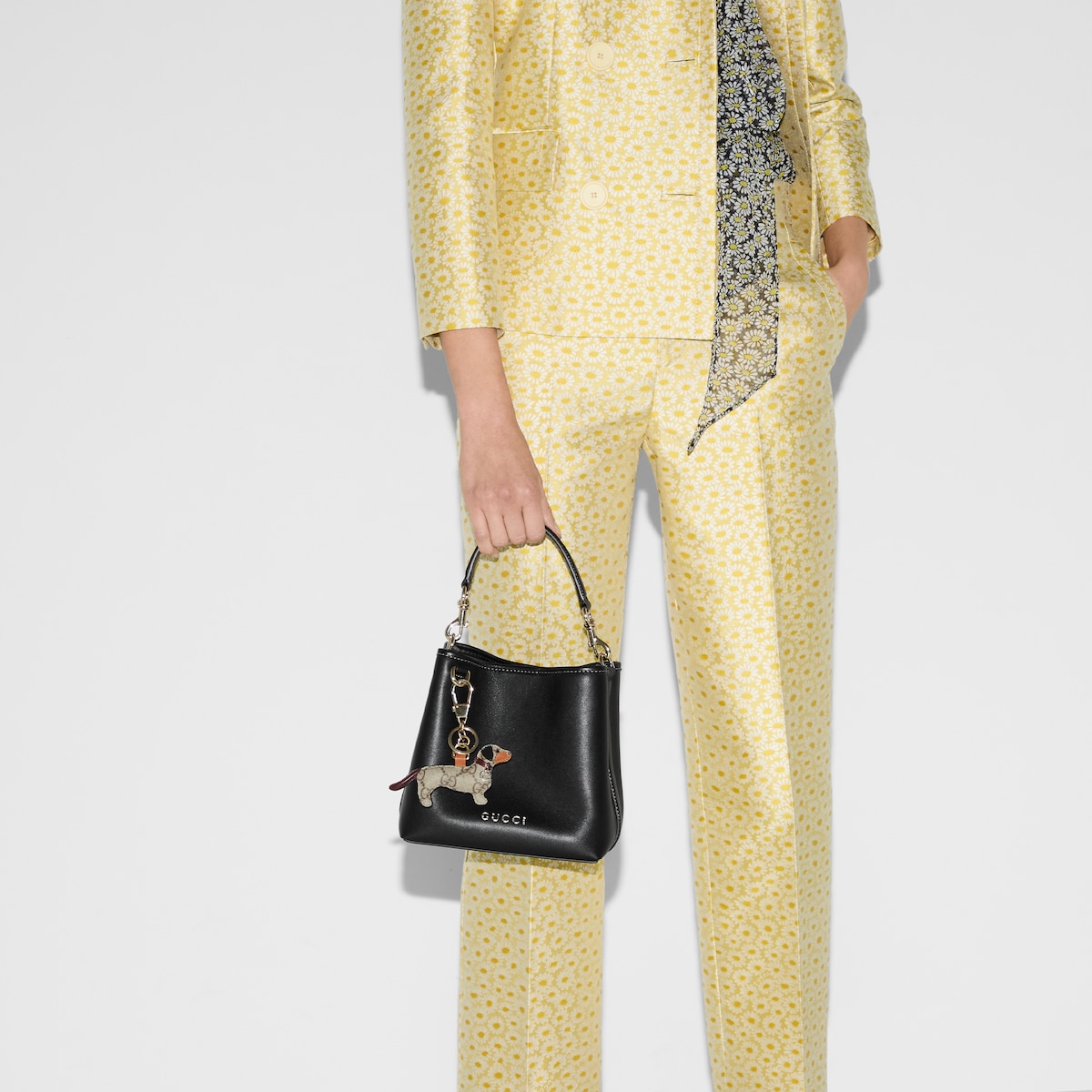 GG Emblem small bucket bag in black leather | GUCCI® US