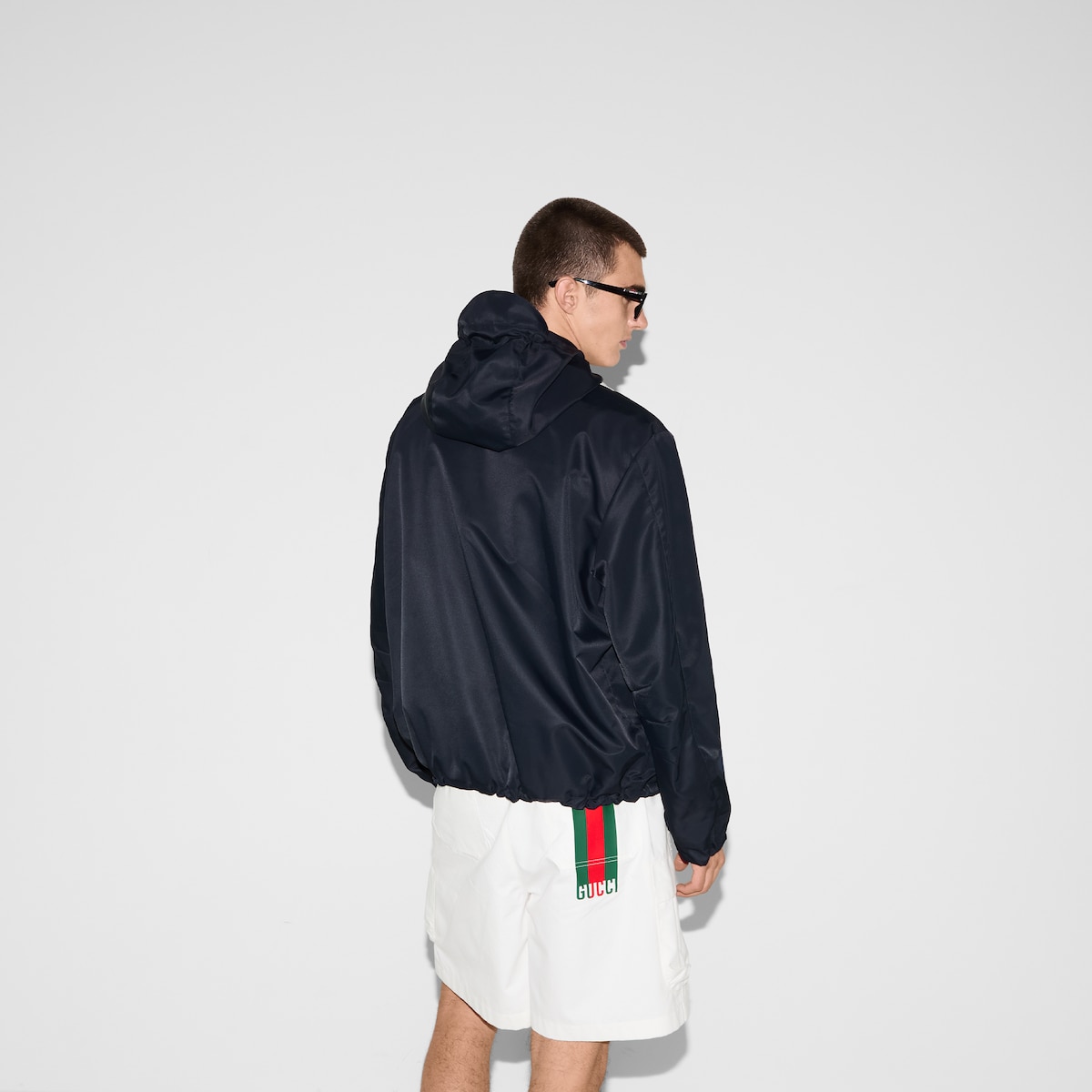 GUCCI ネイビー ビジネスジャケット Reversible nylon canvas jacket in dark blue | GUCCI® US