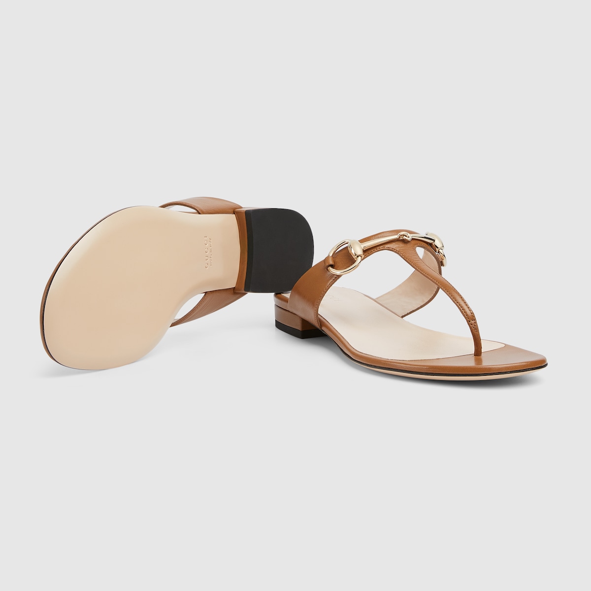 Women's thong sandal with Horsebit in light brown leather