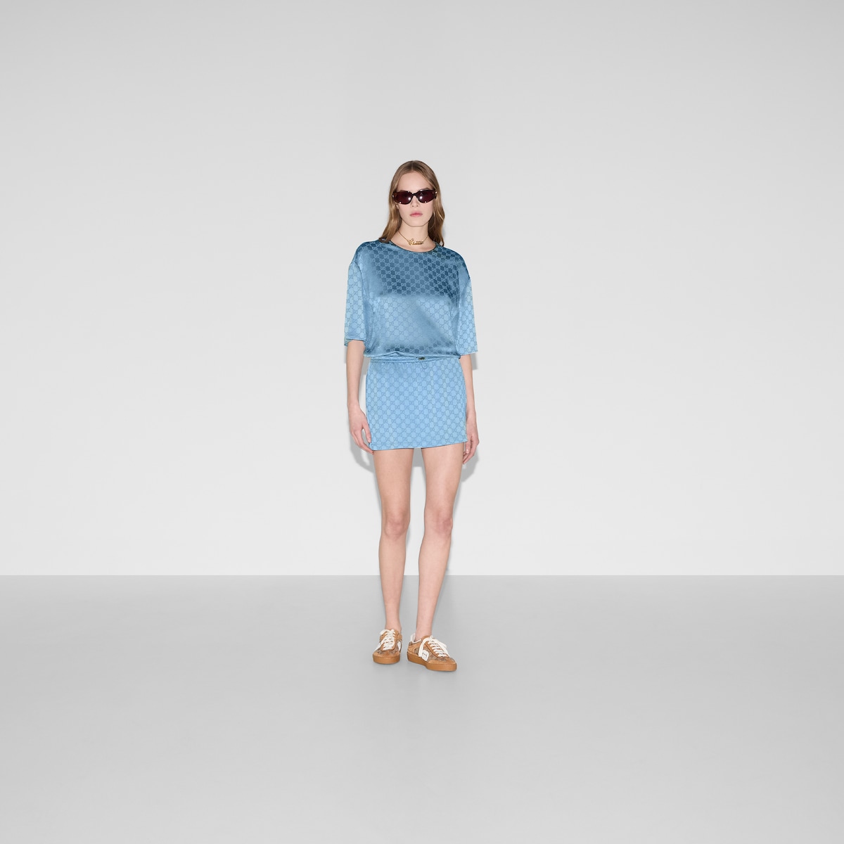 GUCCI|SKIRTS (816066 XJG4L 3336) GG satin mini skirt in light blue | GUCCI® US