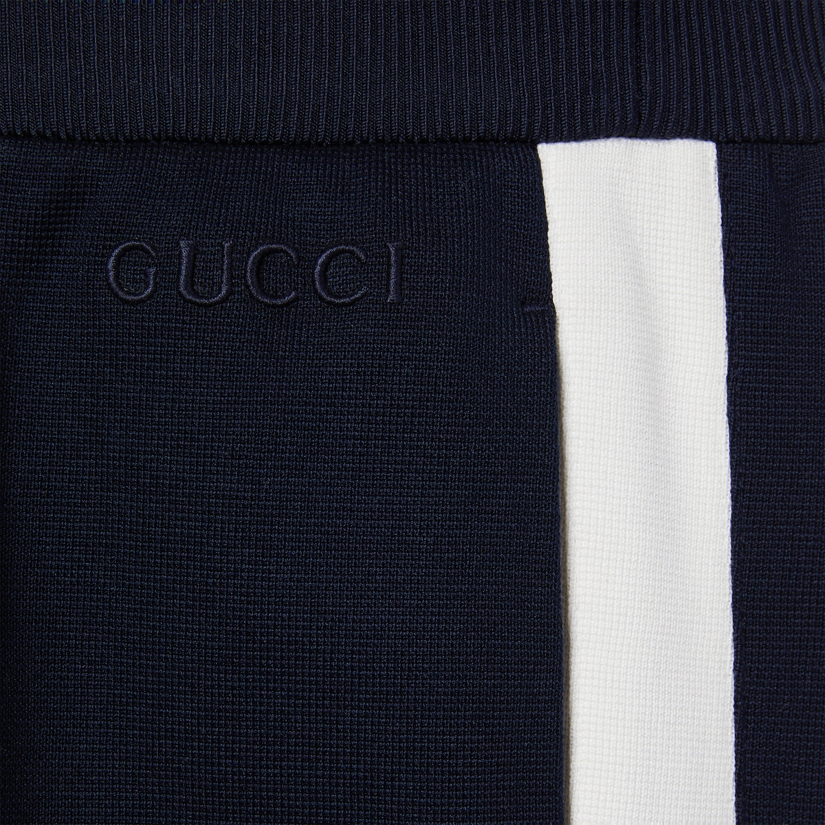 Cotton jersey trousers with embroidery in dark blue and