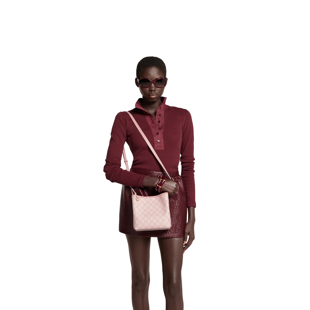 GG Emblem small bucket bag in light pink coated fabric