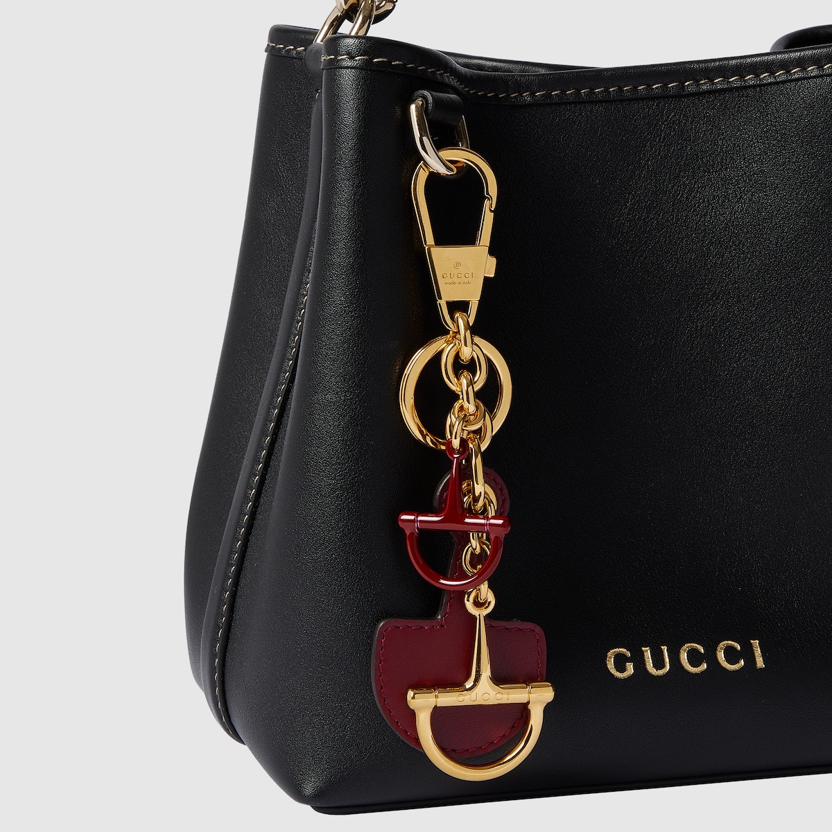 アクセサリー cheri_chanman Half-Horsebit shaped keychain in Rosso Ancora red leather