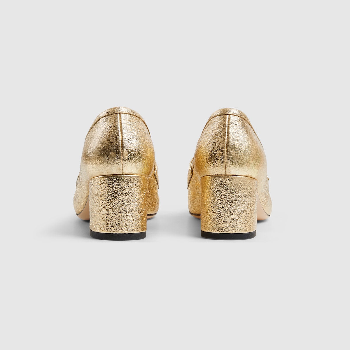Women's loafer pump with Horsebit in golden metallic leather