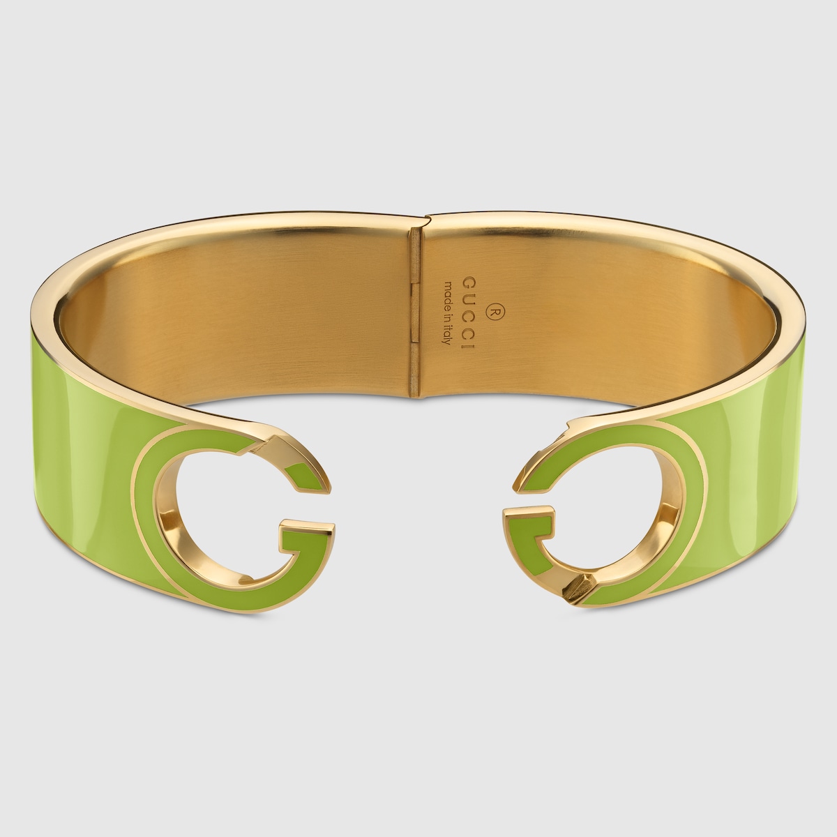 Gucci Interlocking enamel cuff bracelet in yellow gold-toned brass