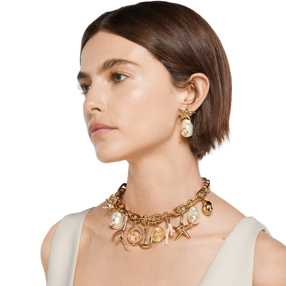 【関税送料込】GUCCI Starfish and pearl drop earrings Starfish and pearl drop earrings in light gold-toned brass