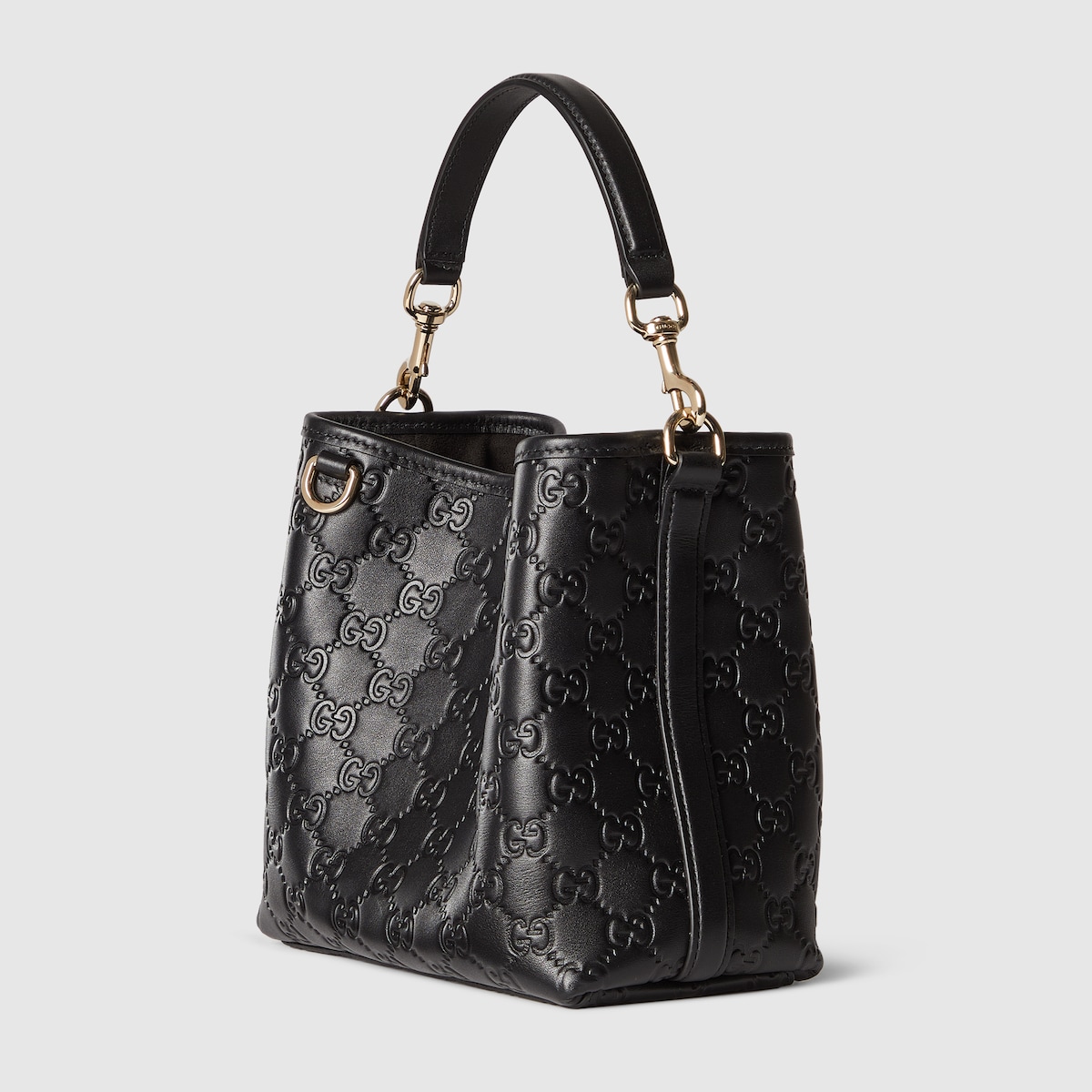 GG Emblem small bucket bag in black GG leather | GUCCI® US