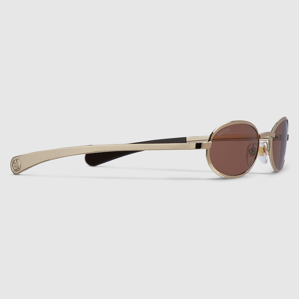Oval frame sunglasses in gold-toned | GUCCI® US