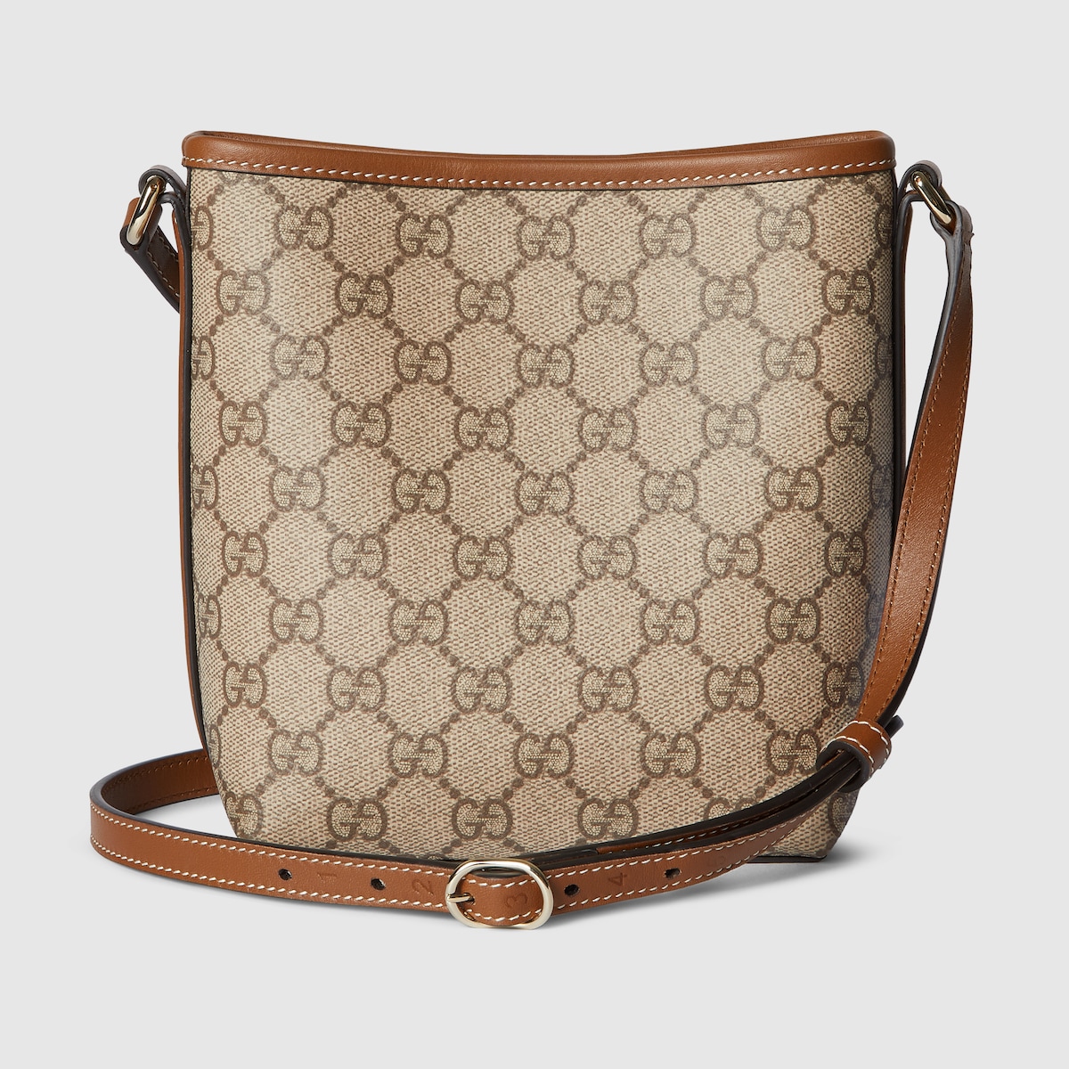 Gucci GGエンブレム　ナノバケット　バッグ GG Emblem nano bucket bag in beige and dark brown fabric | GUCCI® US