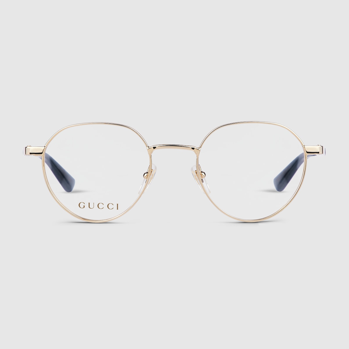Round optical frame in light gold | GUCCI® US