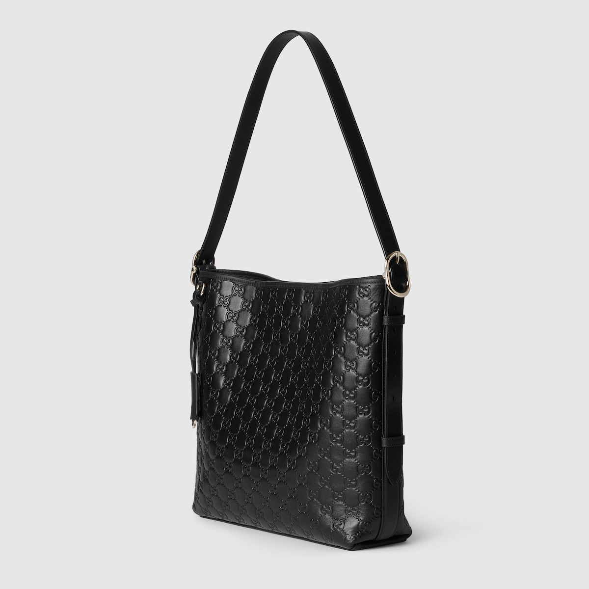 GG Emblem medium shoulder bag in black GG leather | GUCCI® CA